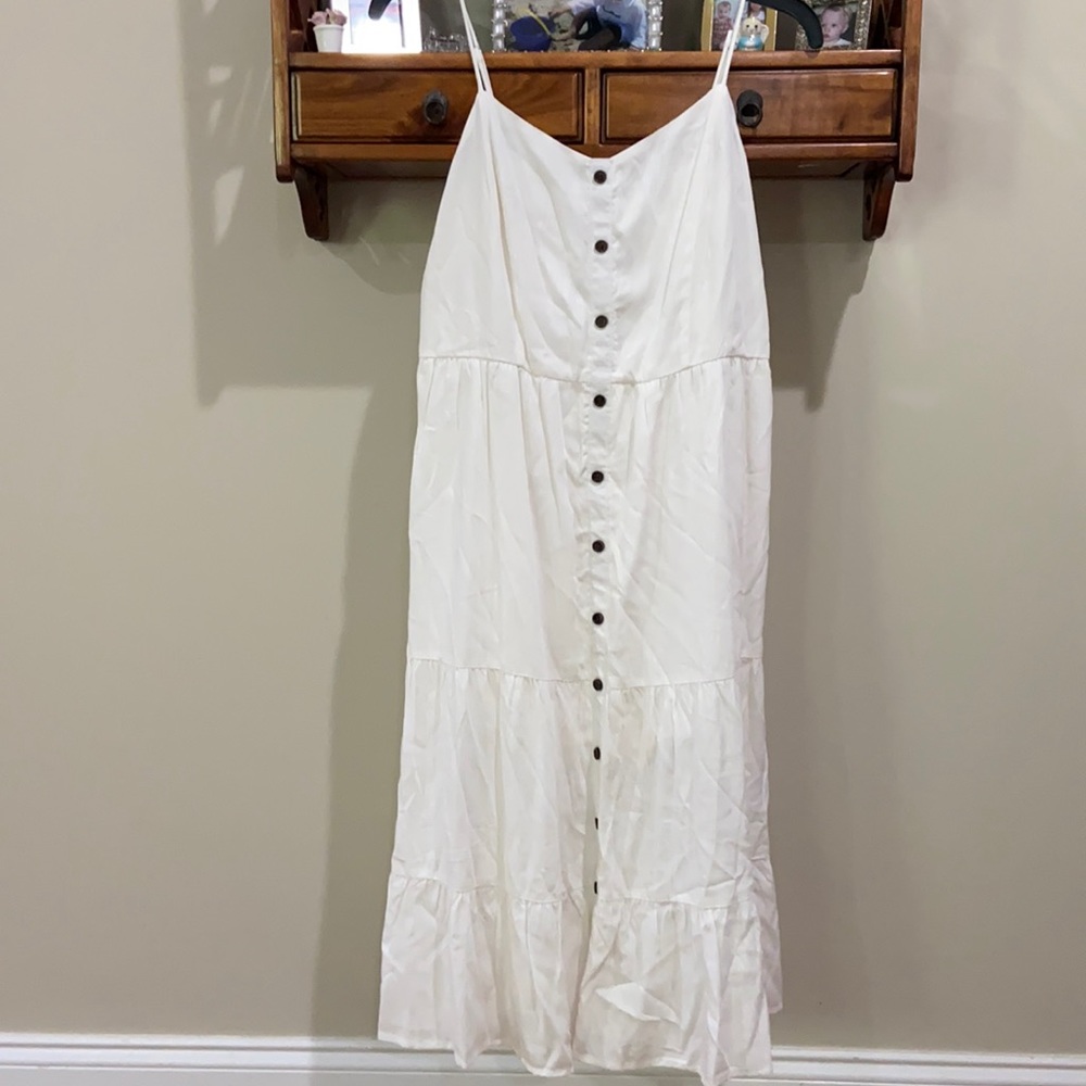 Pink Lily  white dress great classic for your closet.